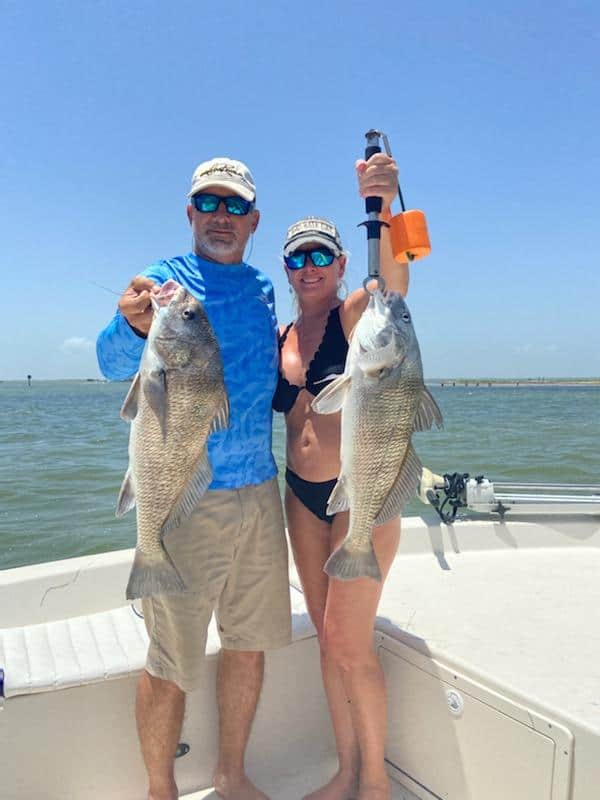 Couple with Caught Fish
